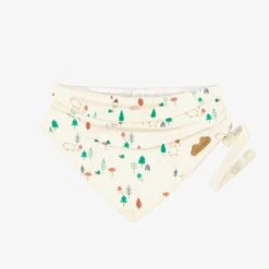 Bavoir Crème à Motifs, Naissance