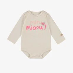 Cache-couche Crème, Naissance