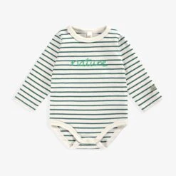 Cache-couche Crème à Rayures Vertes, Naissance